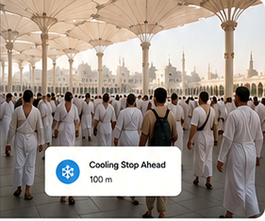 Pilgrims walking through a shaded mosque corridor